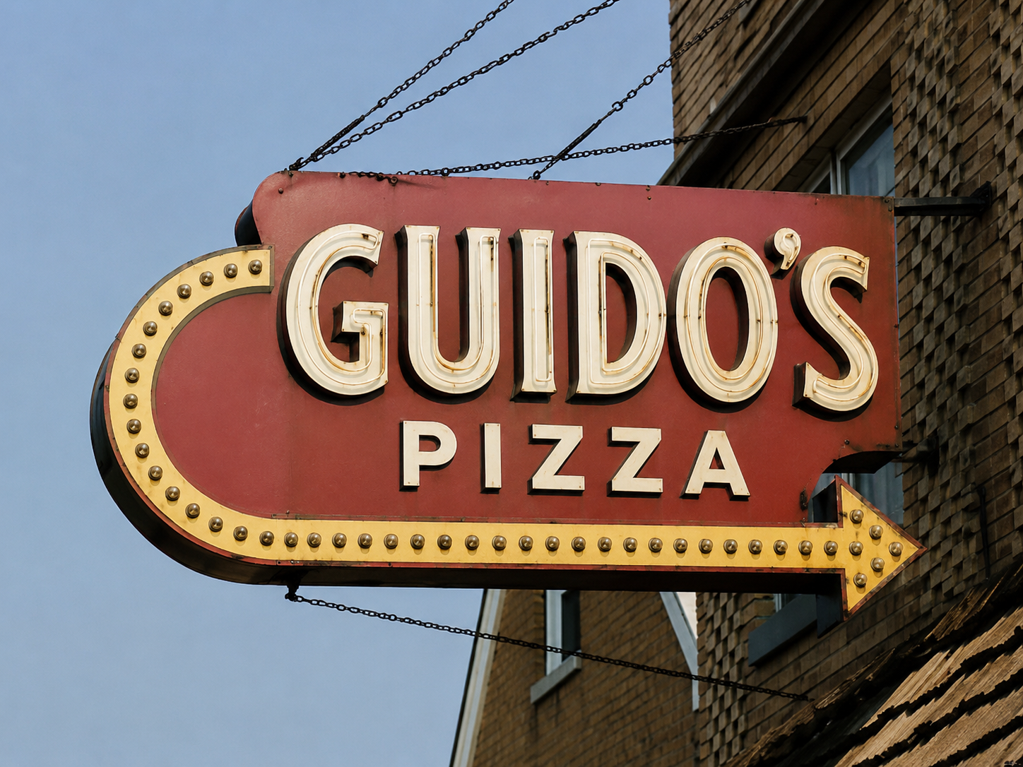 The Guido's Pizza sign